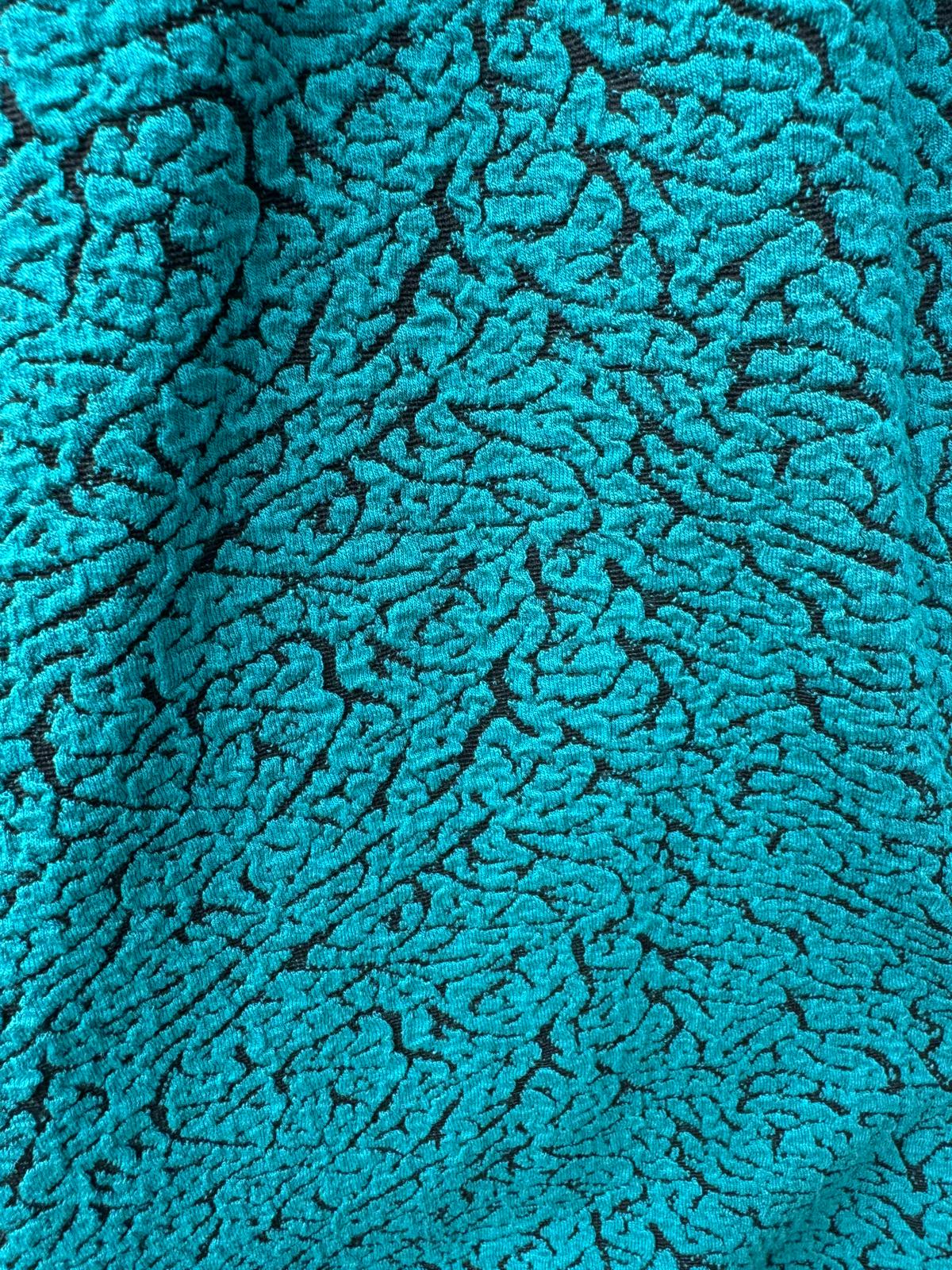 Dutinový úplet – detail plastické struktury látky